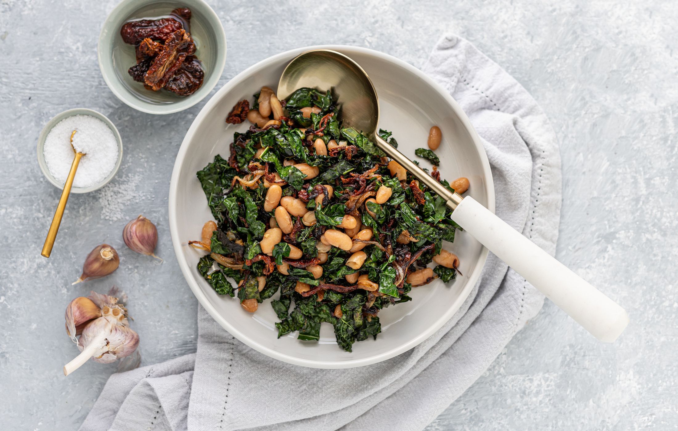 Sautéed Kale with Sundried Tomatoes, Caramelized Onions, and Cannellini Beans